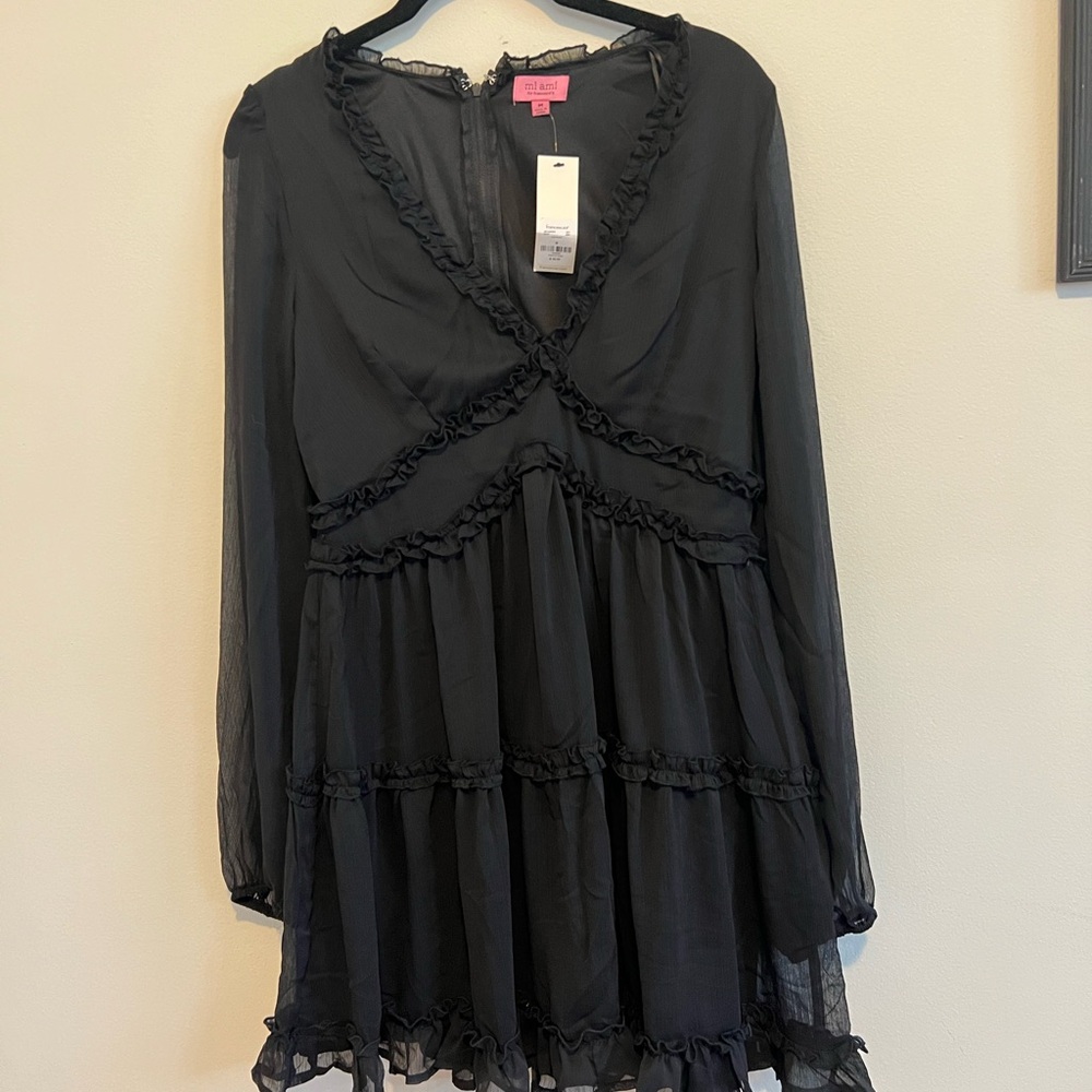Francesca’s long sleeved LBD new with tags
